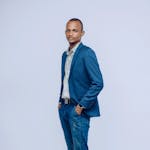 Professional Man in Blue Suit with Confident Pose